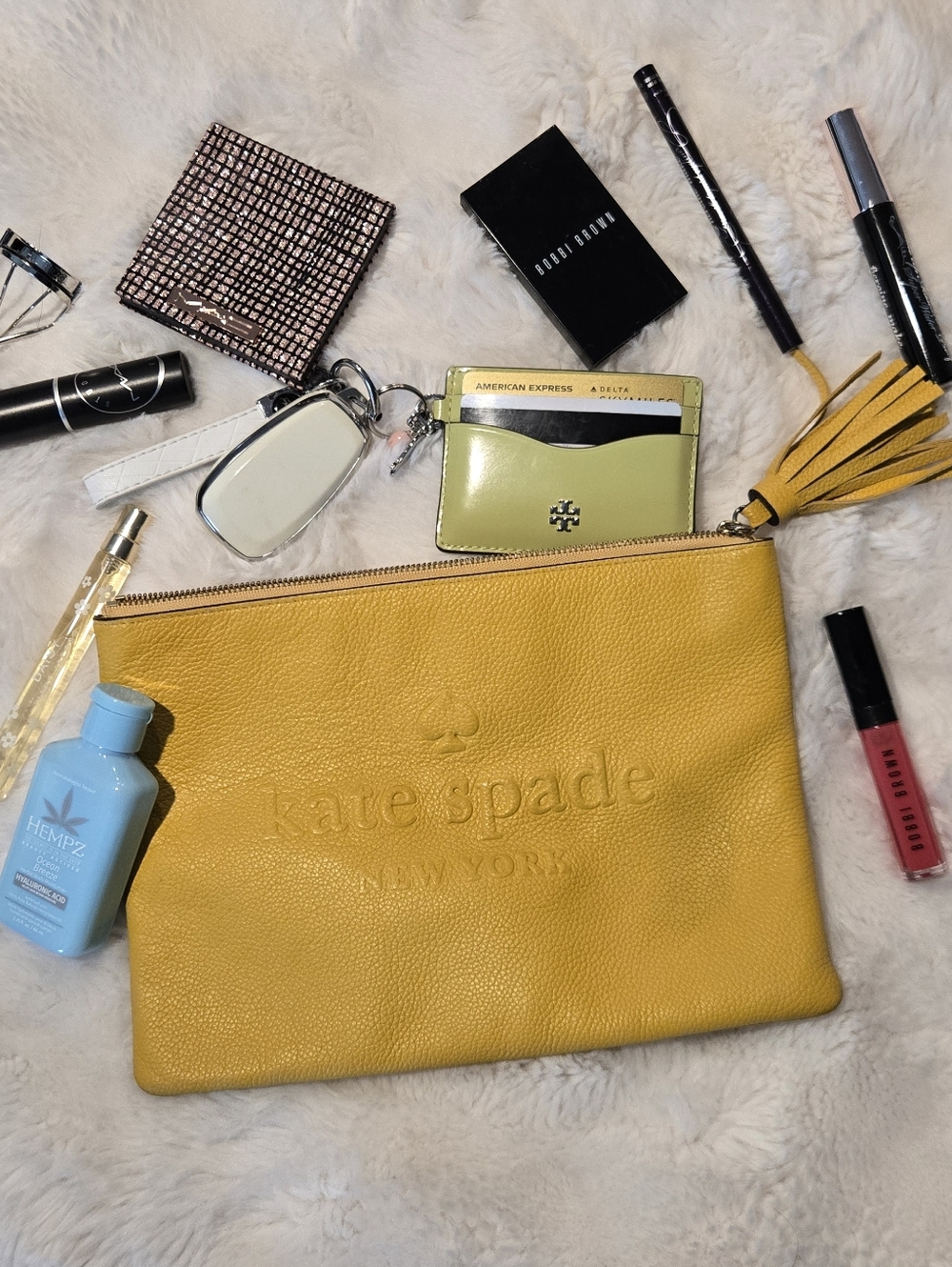 kate spade Yellow Leather Tassel Clutch